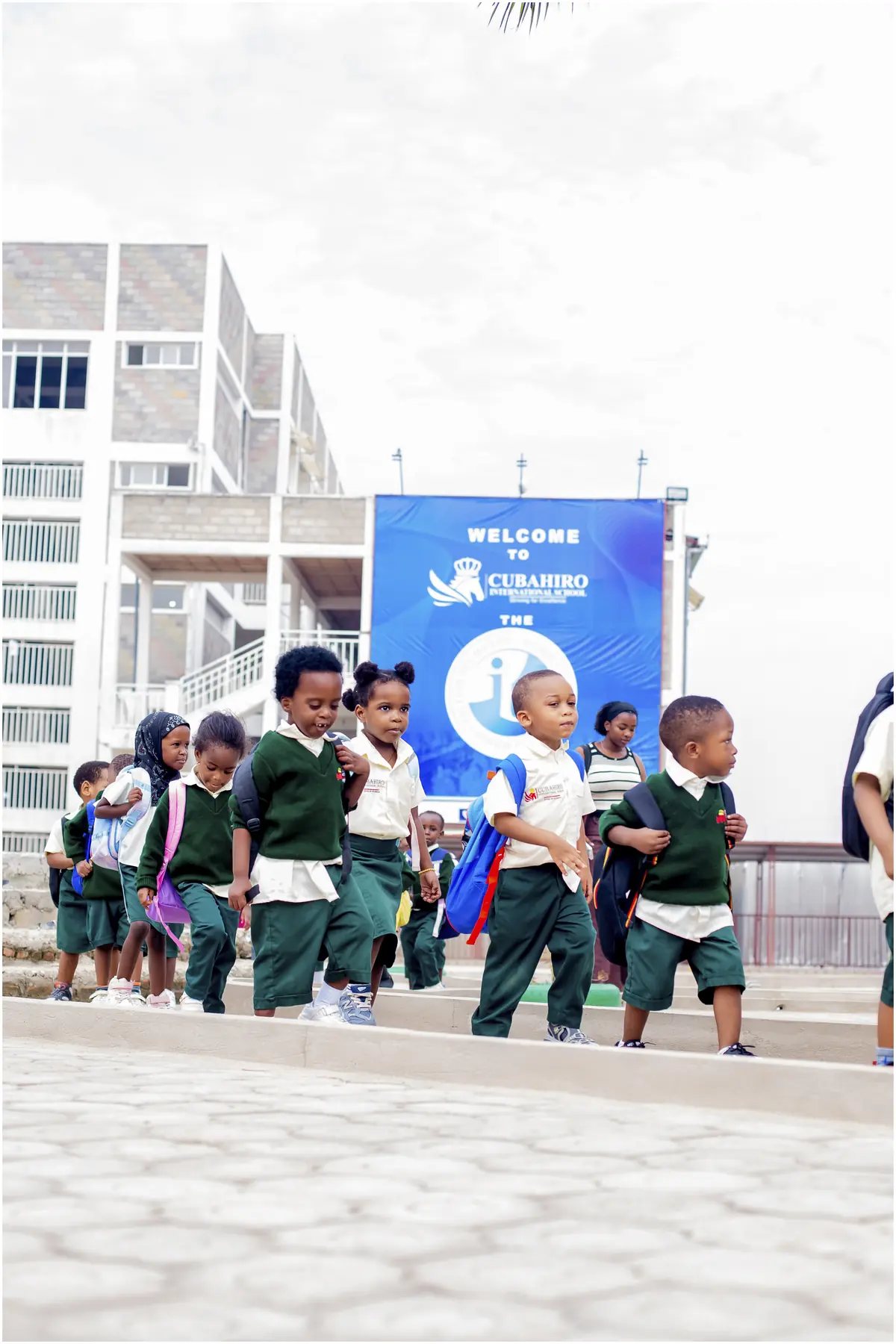 Kindergarten pupils walking on campus