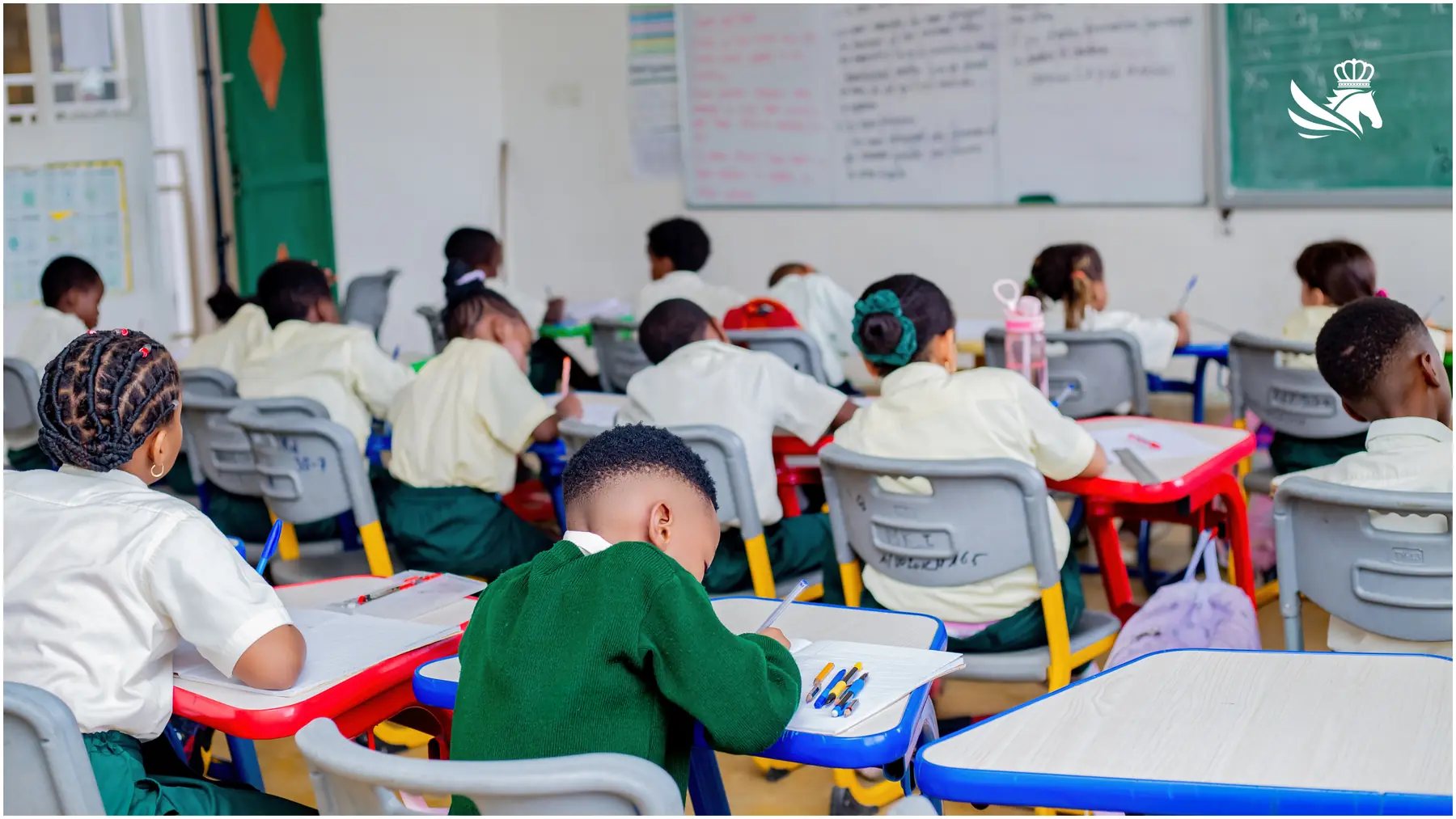 Primary pupils during a classroom writing lesson