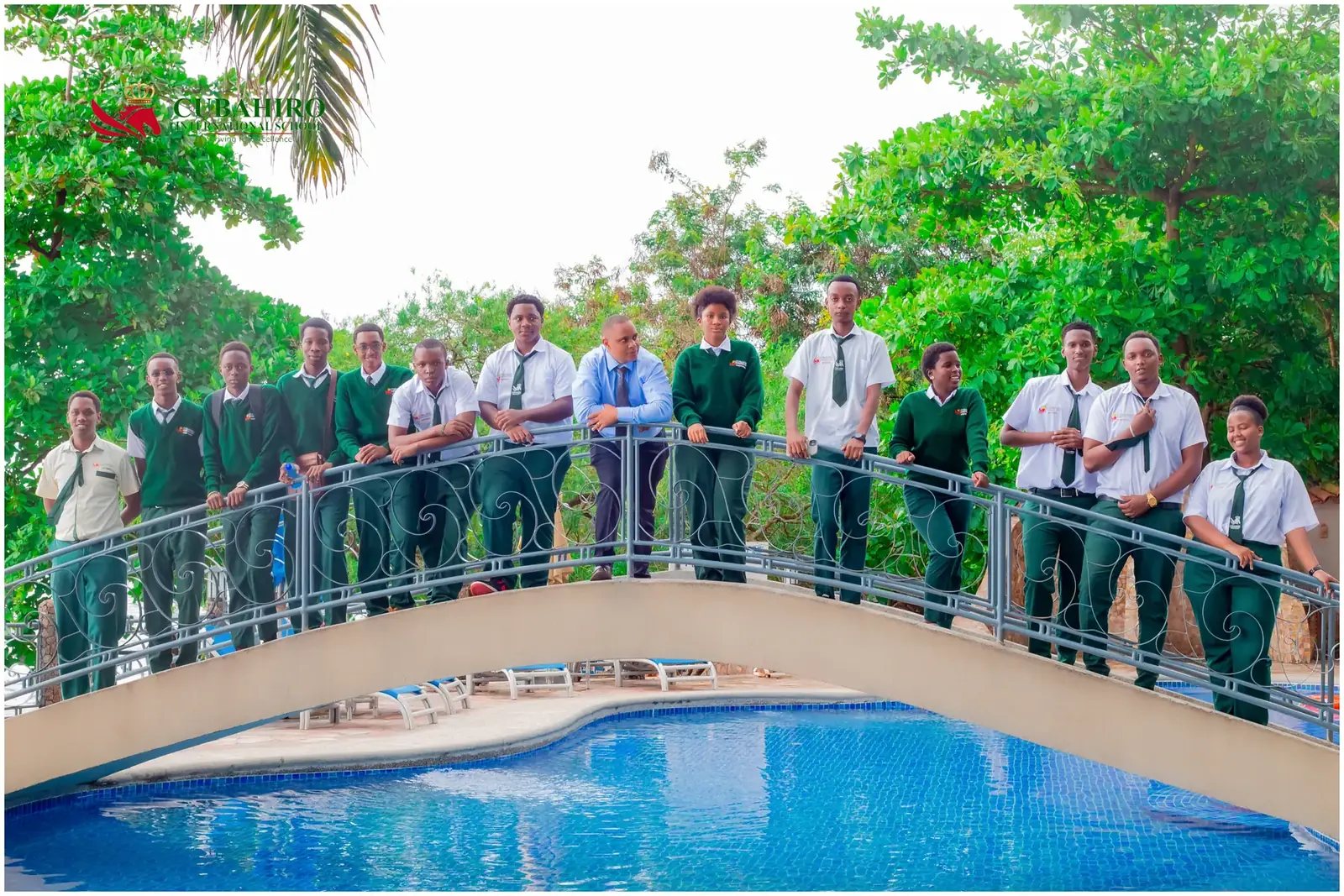 Students gathered on the Cubahiro campus bridge