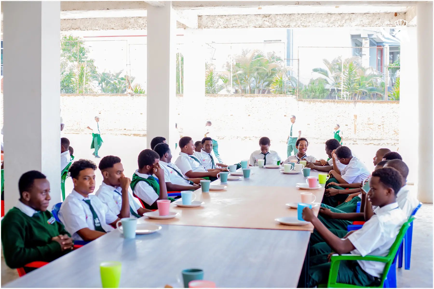 Students sharing a meal break at Cubahiro International School