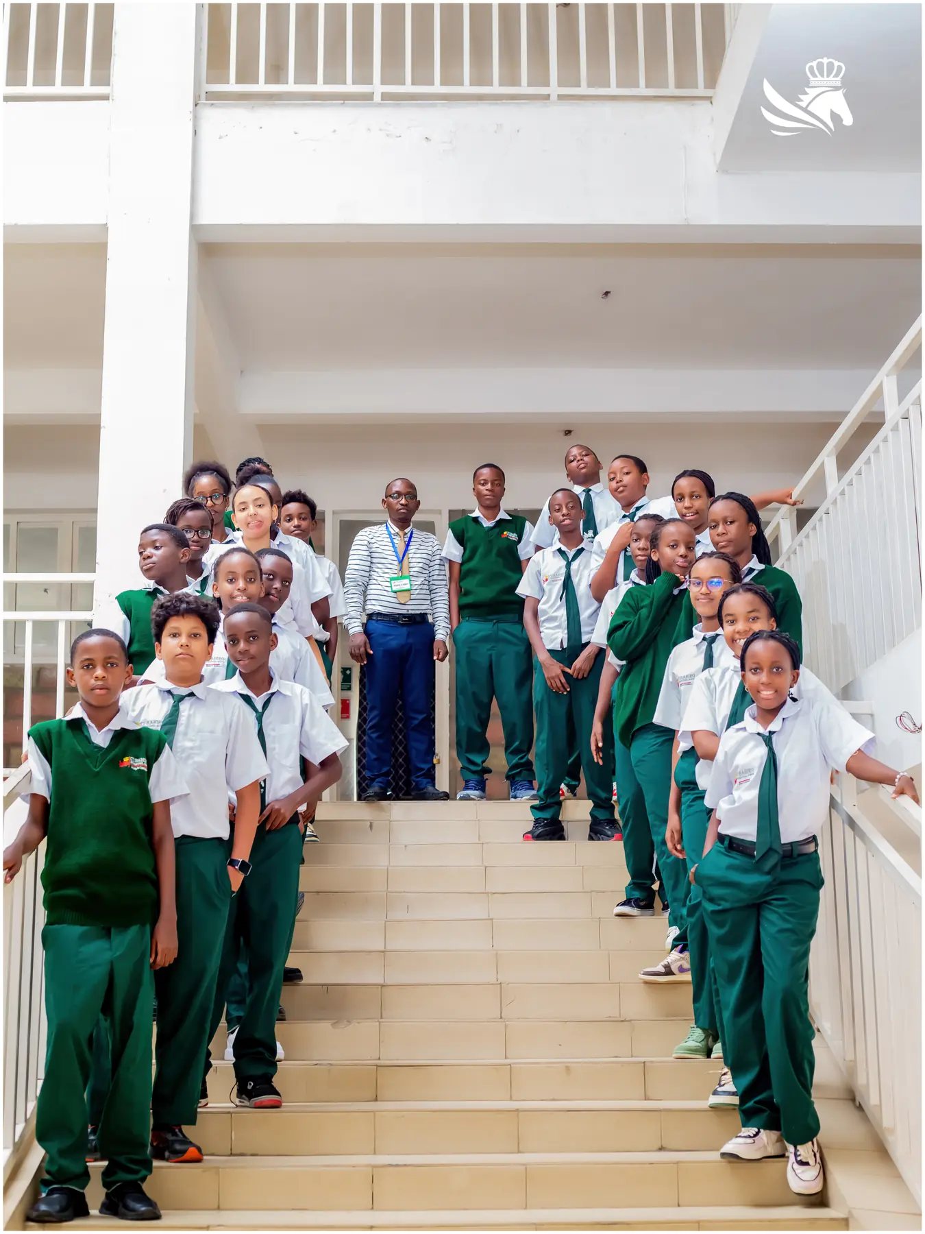 Students gathered on the Cubahiro campus staircase