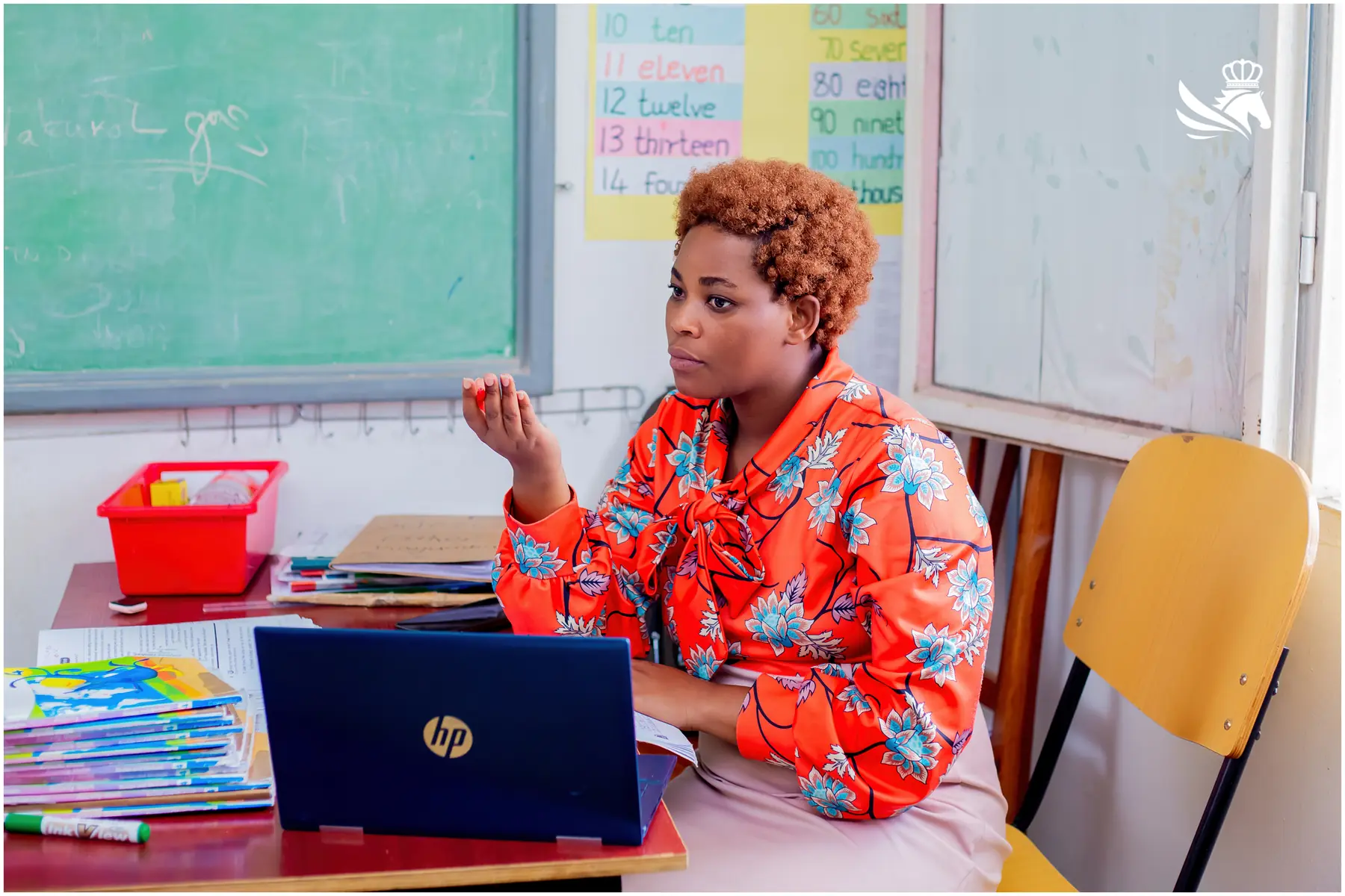 CIS teacher with students during a classroom lesson